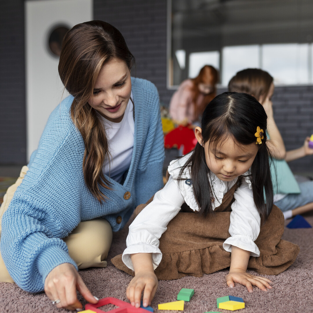 result_full-shot-teacher-helping-girl-learn
